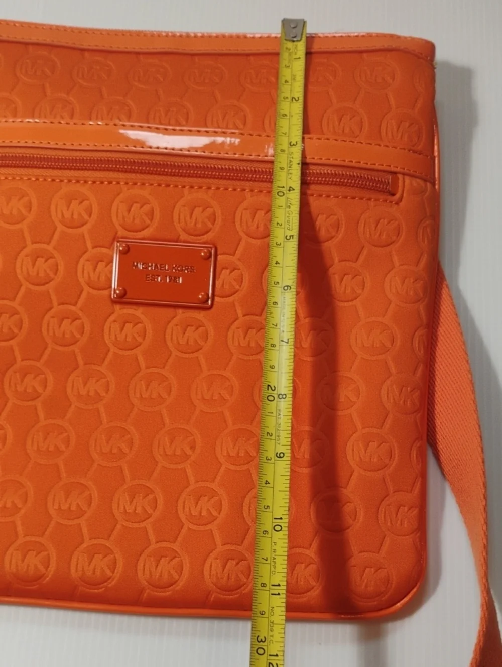 Michael Kors Neoprene Tangerine Mono Embossed Swing Crossbody bag